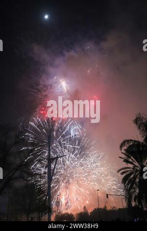 The beautiful fireworks of different colors and shapes exploding in the sky of Valencia during the Fallas celebration Stock Photo