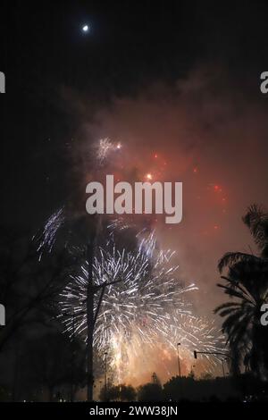 The beautiful fireworks of different colors and shapes exploding in the sky of Valencia during the Fallas celebration Stock Photo