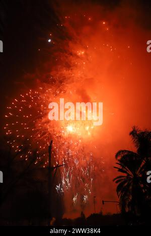 The beautiful fireworks of different colors and shapes exploding in the sky of Valencia during the Fallas celebration Stock Photo