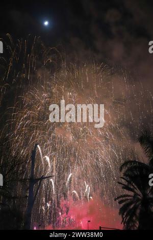 The beautiful fireworks of different colors and shapes exploding in the sky of Valencia during the Fallas celebration Stock Photo