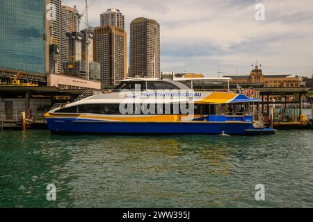 A Manly Fast Ferry boat at Circular Quay, Sydney Harbour, Sydney, Australia Stock Photo