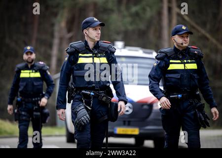 OSSENDRECHT - Police officers in action during a demonstration by the riot police after the presentation of the new uniform of the Zeeland-West Brabant unit at a police training location. ANP ROBIN VAN LONKHUIJSEN netherlands out - belgium out Stock Photo