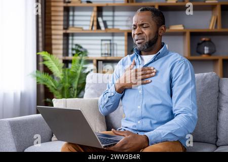 A male patient engages in a virtual consultation, seeking medical guidance from a healthcare professional. Stock Photo