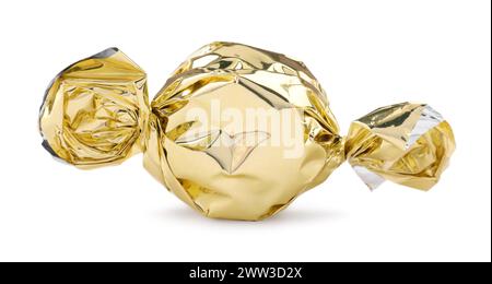 Candy in golden wrapper isolated on white Stock Photo