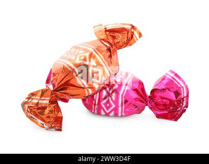 Sweet candies in colorful wrappers on white background Stock Photo