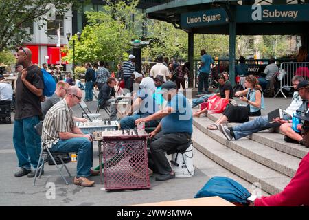 Strategic Chess Battles and City Bustle at Union Square Stock Photo