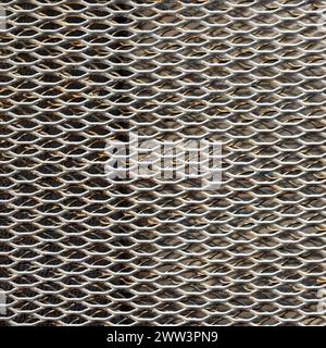 Rusty white metal grille wall, close up square photo texture Stock Photo