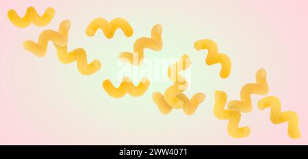 Raw cavatappi pasta falling on color background Stock Photo