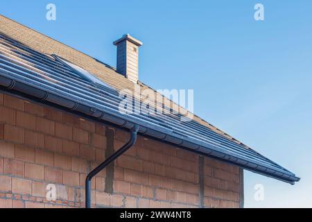 The frozen roof of the house under construction. Winter morning at the construction site Stock Photo