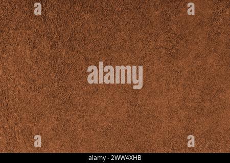 Suede leather texture background, orange genuine leather, natural skin animal, top view. Texture for design, background, wallpaper and design Stock Photo