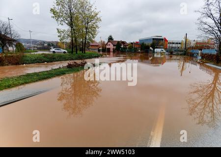Torrential rain causes flash floods in the city area. Buildings ...