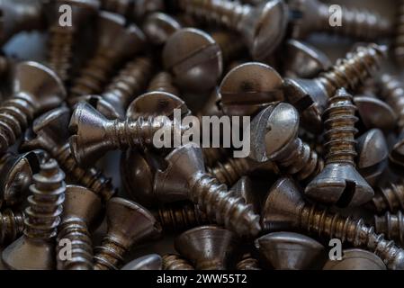 Close-up of a pile of small silver colored screws Stock Photo
