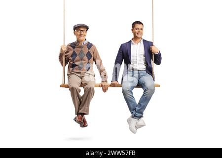 Father and son sitting together on a big wooden swing isolated on white background Stock Photo