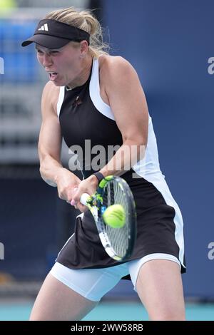 Miami, Florida, USA. 21st Mar, 2024. Caroline Wozniacki (Denmark) hits a backhand against Angelina Kalinin (Ukraine) during the second round of women's singles at the Miami Open tennis tournament. (Credit Image: © Richard Dole/ZUMA Press Wire) EDITORIAL USAGE ONLY! Not for Commercial USAGE! Stock Photo