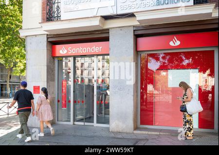 Madrid, Spain. 21st Mar, 2024. Pedestrians walk past the Spanish multinational commercial bank and financial services, Santander Bank, in Spain. (Photo by Xavi Lopez/SOPA Images/Sipa USA) Credit: Sipa USA/Alamy Live News Stock Photo