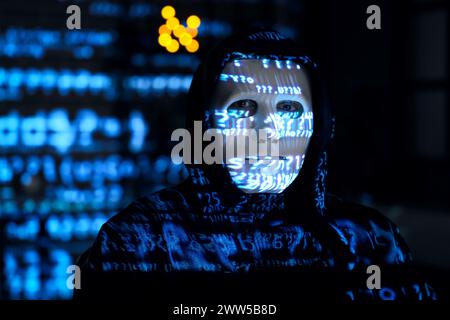 Hacker and projection of programming code in dark room, closeup Stock Photo