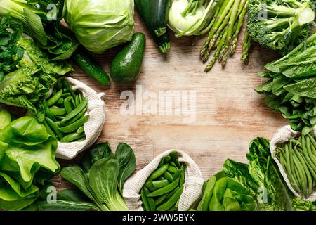 Vegetables background. Various vegetables on kitchen table. Clean eating, healthy food concept, flat lay, top down view Stock Photo