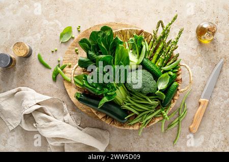 Green vegetable background. Various green vegetables. Veggies. Clean eating, healthy vegetarian, vegan food concept, copy space, top view Stock Photo