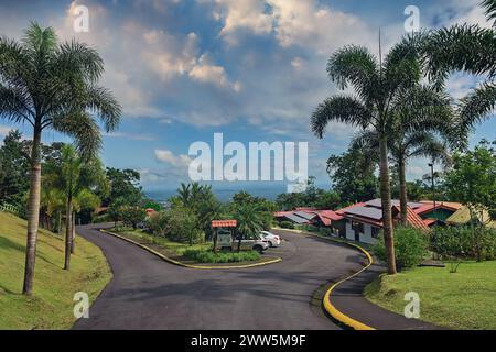 A street in La Fortuna de San Carlos , Costa Rica. The small jungle town of Costa Rica is popular with tourists looking to admire the Arenal volcano a Stock Photo