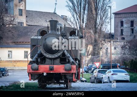 Picture of a serbian steam locomotive standing in a courtyard of an abandoned train station in Pancevo, Serbia. Stock Photo