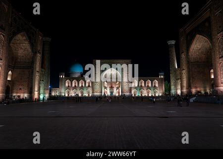 Samarkand at dusk. Historic Registan square with three madrasahs Ulugh Beg, Tilya-Kori and Sher-Dor Stock Photo