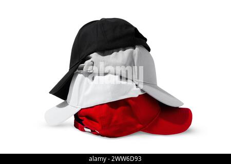 Folded Baseball Caps in Red, Black, White and Grey on a White Background Stock Photo