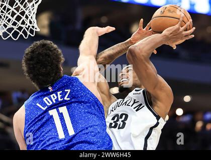 Milwaukee, USA. 21st Mar, 2024. Brooklyn Nets center Nic Claxton (R) goes for a layup during the NBA regular season game between Milwaukee Bucks and Brooklyn Nets in Milwaukee, the United States, March 21, 2024. Credit: Joel Lerner/Xinhua/Alamy Live News Stock Photo