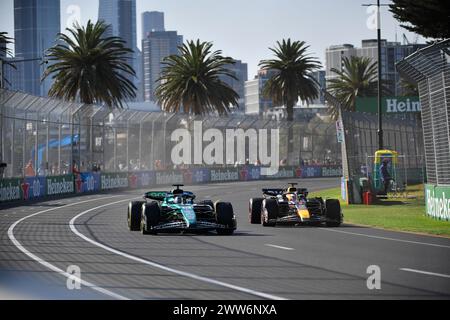 MELBOURNE, AUSTRALIA. 22 March 2024.  Lance Stroll  (CAN) (left) Aston Martin Aramco F1 Team driving the (18) Aston Martin Aramco-Mercedes AMR24 and  Max Verstappen (NED) Oracle Red Bull Racing driving the (1) Red Bull Racing-Honda RBPT RB20 during the free practice 2 session at the FIA Formula 1 Rolex Australian Grand Prix 2024 3rd round from 22nd to 24th March at the Albert Park Street Circuit, Melbourne, Australia. Credit: Karl Phillipson/Alamy Live News Stock Photo