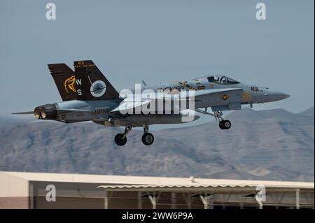 A U.S. Marine Corps F-18C Hornet assigned to Marine Fighter Attack Squadron 323, Marine Corps Air Station Miramar, CA, takes off for a Red Flag Stock Photo