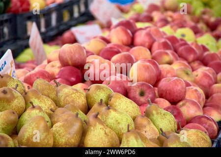 Fruit stall selling apples and pears at the Barcelos fair in Portugal Stock Photo