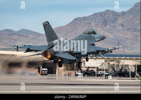 An F-16 Aggressor assigned to the 706th Aggressor Squadron takes off for a Red Flag-Nellis 24-2 mission at Nellis AFB, Nevada, March 14, 2024 Stock Photo