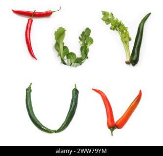 Letters t u v from chili pepper, red, green chilies, salad leaves capital letter made of vegetables, for menu card text, cook book, vegan recipe Stock Photo