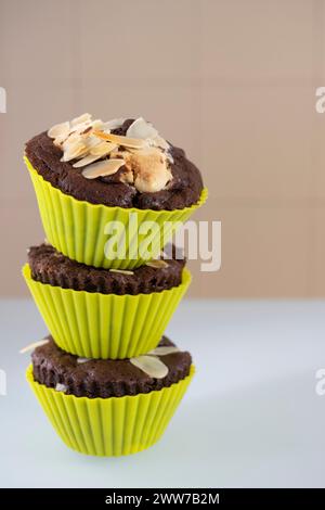 A closeup shot of homemade chocolate muffins stacked on top of each other Stock Photo