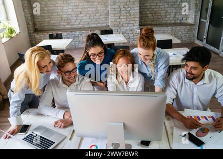 Creative managers crew, business people, designer working with new startup project in office. Stock Photo