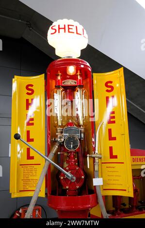 RETRO CLASSICS 2010, Stuttgart Messe, Old red and yellow Shell petrol pump with vintage charm in an exhibition room, Stuttgart Messe, Stuttgart Stock Photo