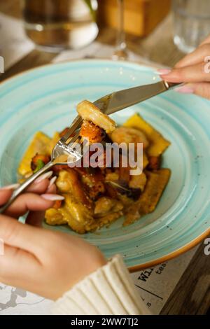 Roasted Italian ravioli with cheese and sauce Stock Photo - Alamy
