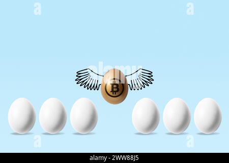 Golden egg with a bitcoin sign flying above white eggs on blue background. Minimal investment concept. Stock Photo