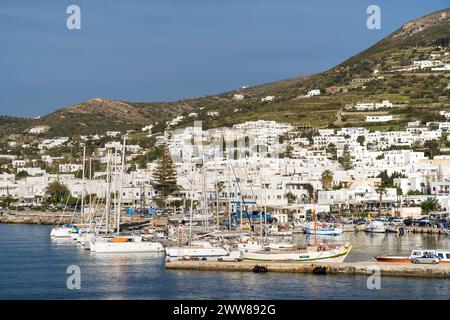 Boats and yachts resting at the small port of Parikia, at the picturesque island of Paros, in the Cyclades islands, Greece, Europe. Stock Photo