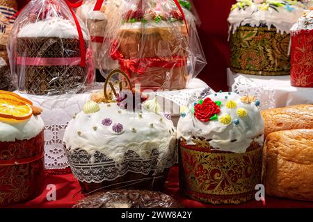 Fresh various traditional Orthodox Easter cakes in bakery showcase. Sale of Easter cakes in the store. Stock Photo