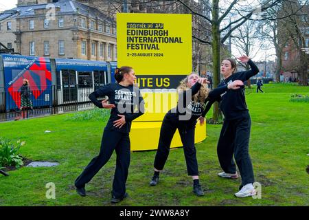 Edinburgh, Scotland. Friday 22nd, March, 2024. This week tickets to the Edinburgh International Festival go on sale to the public. To mark the occasion, St Andrew Square sees young Scottish Ballet dancers performing with a giant version of this years brochure which are on display in various key Edinburgh locations. For the next three days a different artist will perform inside the brochure. Credit: Brian Anderson Stock Photo