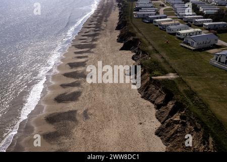 erosion of cliffs at skipsea on the east coast of yorkshire showing danger to caravan site elevated view Stock Photo