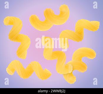 Raw cavatappi pasta falling on color background Stock Photo