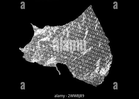 Transparent bubble wrap on black background, top view Stock Photo