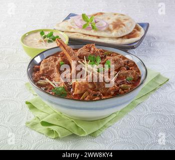 Korma or Qorma is a delicious stew prepared by mutton or lamb meat. Stock Photo