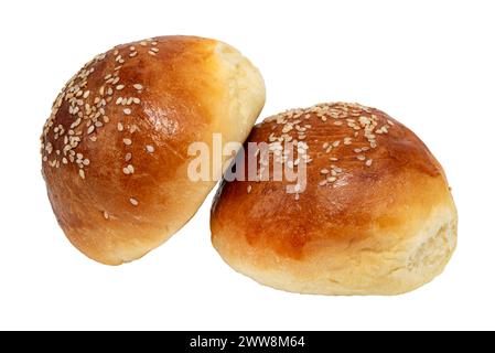 Sweet fragrant bun on a white background. Isolate buns with sesame seeds. homemade baking Stock Photo