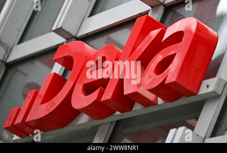 PRODUCTION - 22 March 2024, Hesse, Frankfurt/Main: DekaBank's 'Deka' logo is emblazoned on the façade of the Trainon tower at the bank's headquarters. On March 26, 2024, the Wertpapierhaus of the Sparkassen-Finanzgruppe presents the balance sheet for the past financial year 2023. Photo: Arne Dedert/dpa Stock Photo