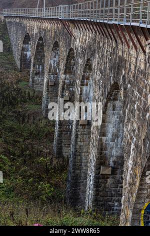 Old stone arched bridge-viaduct, Ternopil region, Ukraine. Stock Photo