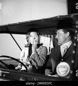 PATRICK MACNEE as John Steed and DIANA RIGG as Emma Peel take a ride in a jeep in a scene from the A SURFEIT OF H20 episode 8 of the fourth series of THE AVENGERS TV Series first broadcast  on November 16 1965 Director SIDNEY HAYERS Written by COLIN FINBOW Wardrobe JACKIE JACKSON and JEAN MUIR Music LAURIE JOHNSON Associated British Productions for ABC TV Stock Photo