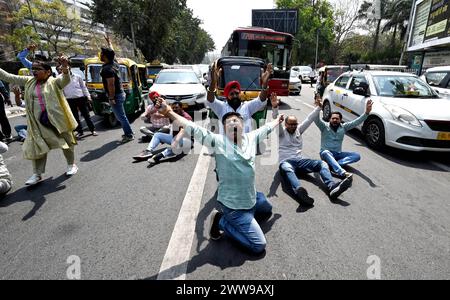 New Delhi, India. 22nd Mar, 2024. NEW DELHI, INDIA - MARCH 22: AAP workers protest against the arrest of AAP leader and Delhi's Chief Minister Arvind Kejriwal, at ITO Chowk on March 22, 2024 in New Delhi, India. (Photo by Sanchit Khanna Hindustan Times/Sipa USA) Credit: Sipa USA/Alamy Live News Stock Photo