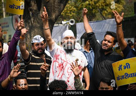 New Delhi, India. 22nd Mar, 2024. NEW DELHI, INDIA - MARCH 22: AAP workers protest against the arrest of AAP leader and Delhi's Chief Minister Arvind Kejriwal, at ITO Chowk on March 22, 2024 in New Delhi, India. (Photo by Sanchit Khanna Hindustan Times/Sipa USA) Credit: Sipa USA/Alamy Live News Stock Photo